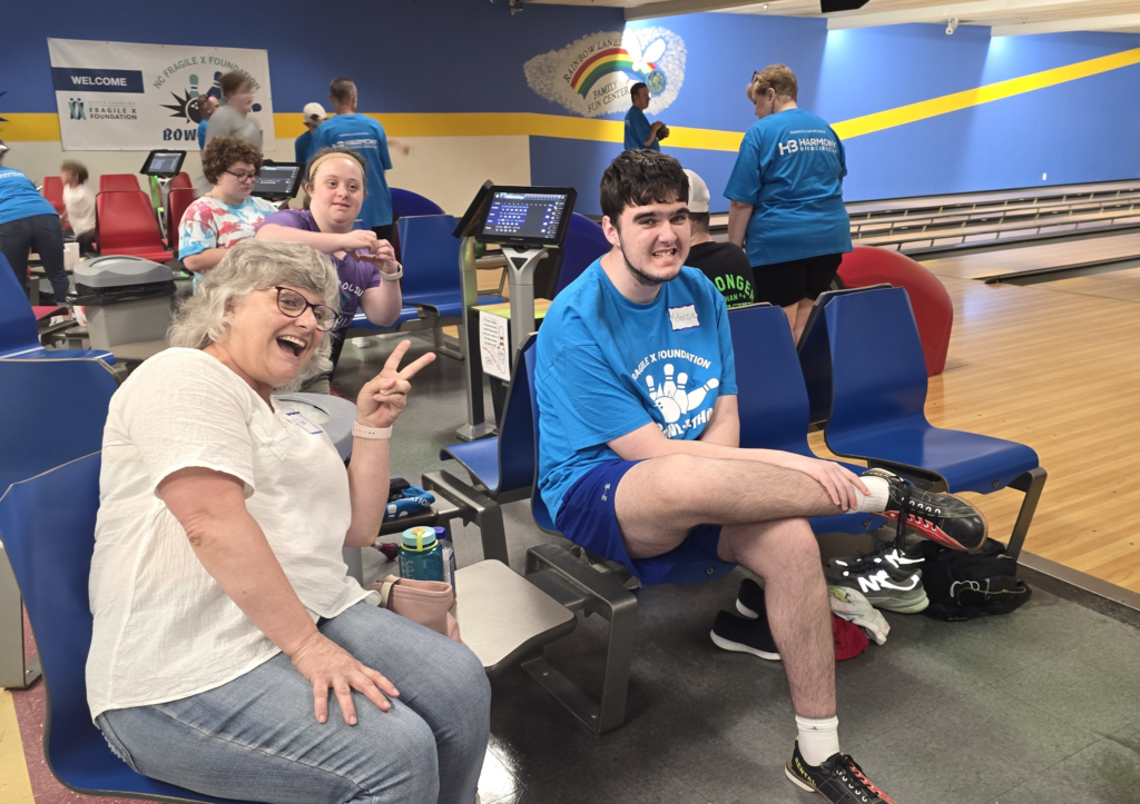 NC DD Council Systems Change Manager Pam Dempsey, Caroline Dempsey and McKenzie Willis are ready to bowl.
