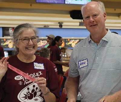 Renee and Len Clark selling raffle tickets
