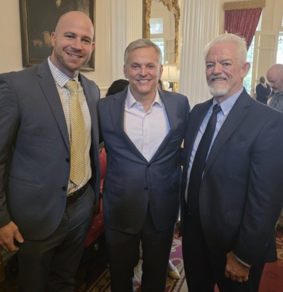 Ryan Rotundo (Asheville), National Down Syndrome Society Director of Community Engagement and Partnerships, Governor Josh Stein, and Steve Strom, NCFXF