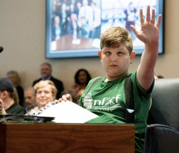 Miles Tillman greets the NCGA I/DD Caucus members