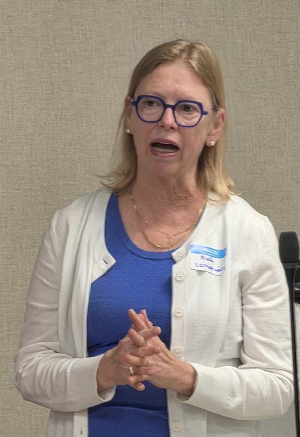 Dr. Ave Lachiewicz addresses the group at the informal listening session.