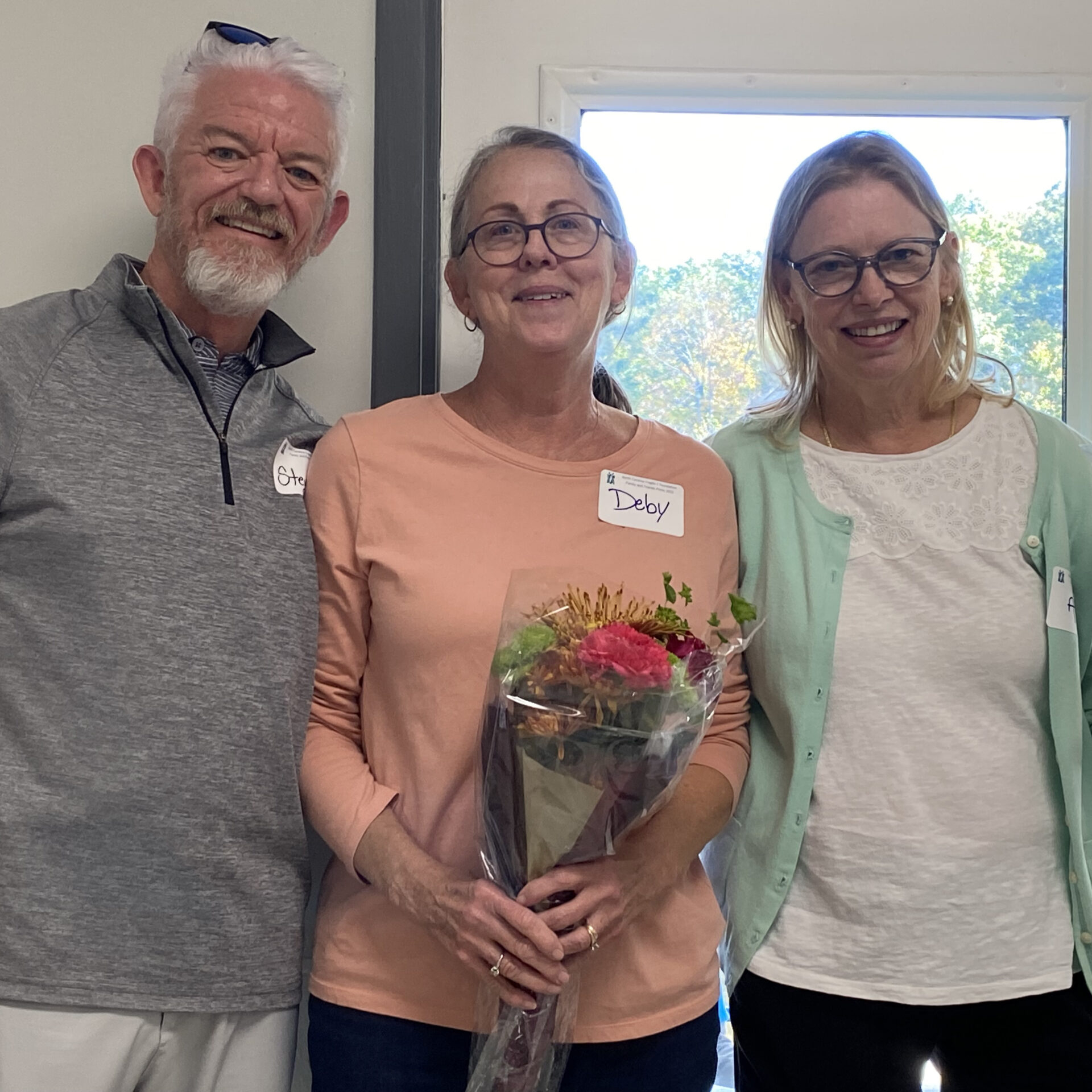 NCFXF President Steve Strom (L) thanked Deby Burgess (Center) and Dr. Ave M. Lachiewicz (R) for their many years of service to the Fragile X community at the 2022 picnic.